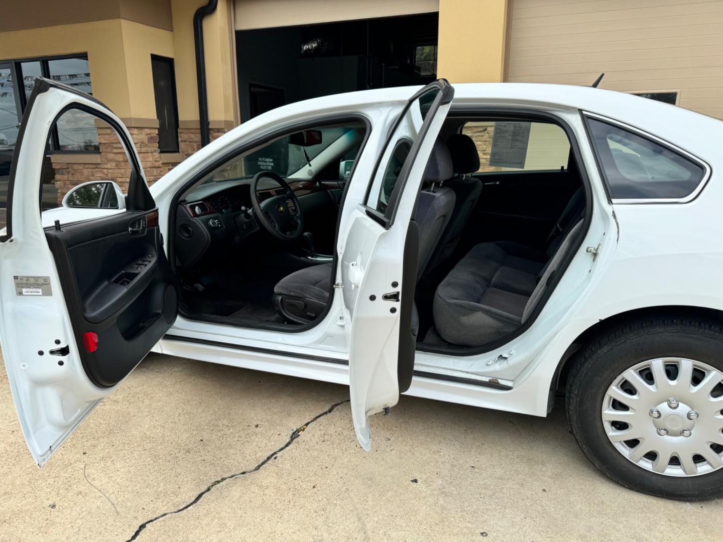 2010 White Chevrolet Impala LS (2G1WA5EK1A1) with an 3.5L V6 OHV 16V FFV engine, 4-Speed Automatic Overdrive transmission, located at 307 West Marshall Avenue, Longview, TX, 75601, (903) 753-3091, 32.500828, -94.742577 - Photo#1