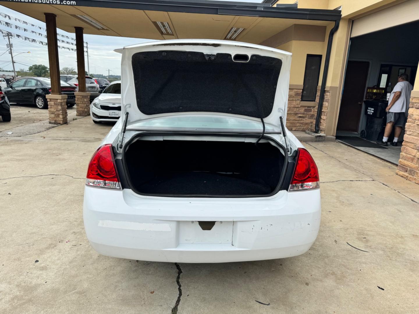 2010 White Chevrolet Impala LS (2G1WA5EK1A1) with an 3.5L V6 OHV 16V FFV engine, 4-Speed Automatic Overdrive transmission, located at 307 West Marshall Avenue, Longview, TX, 75601, (903) 753-3091, 32.500828, -94.742577 - Photo#2