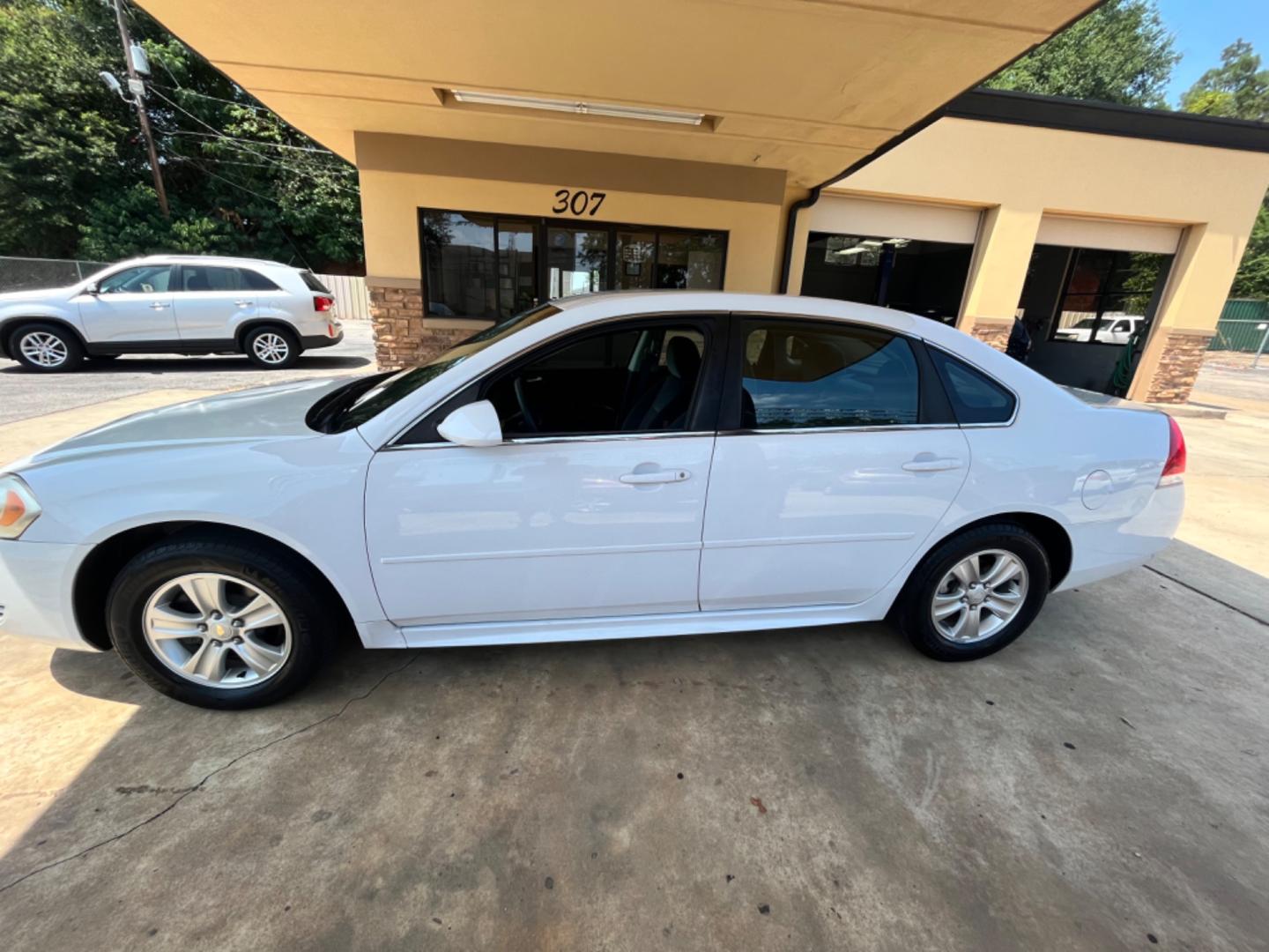 2012 White Chevrolet Impala LS (Fleet) (2G1WF5E31C1) with an 3.6L V6 DOHC 16V FFV engine, 6-Speed Automatic transmission, located at 307 West Marshall Avenue, Longview, TX, 75601, (903) 753-3091, 32.500828, -94.742577 - Photo#0