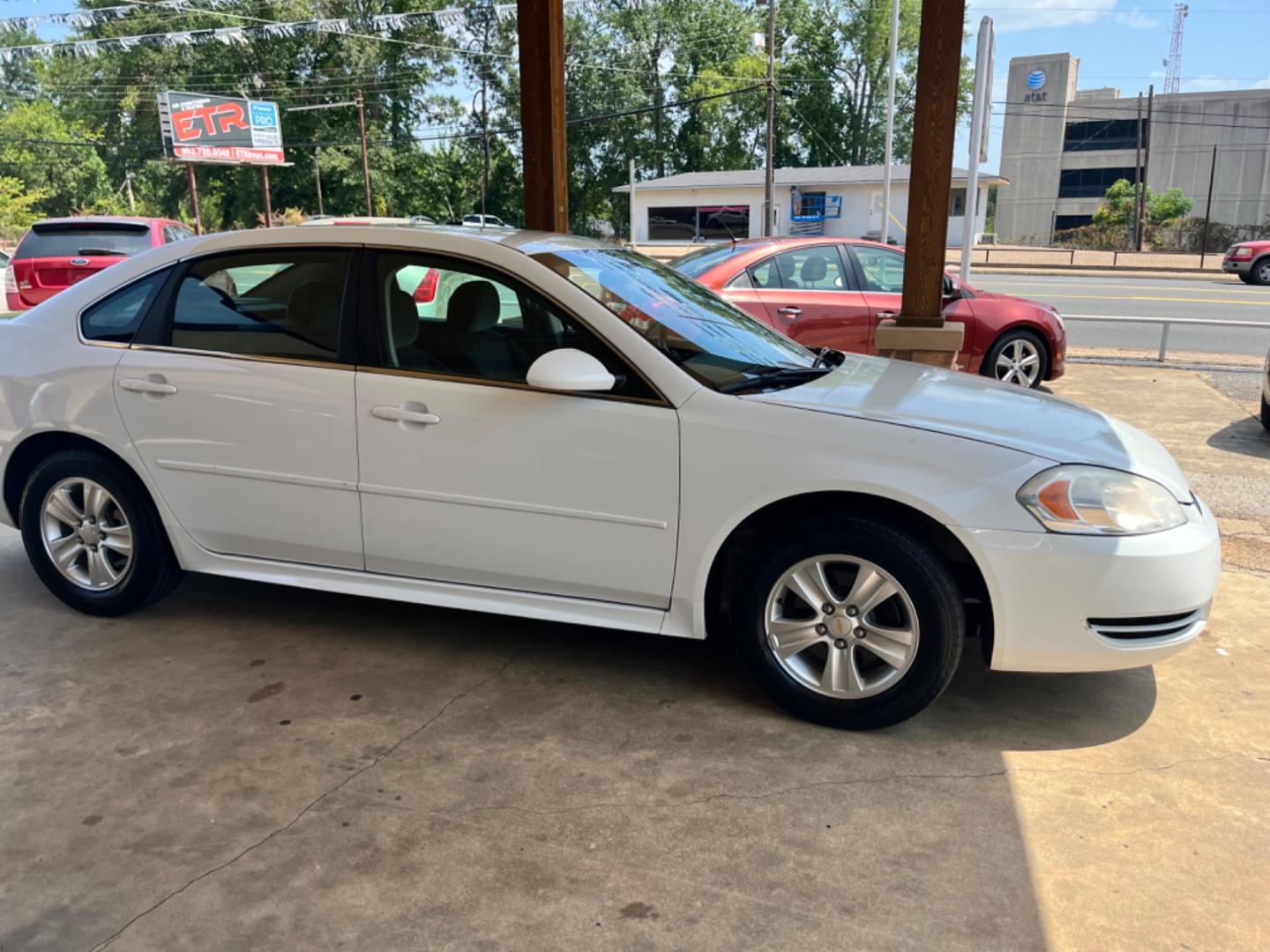 2012 White Chevrolet Impala LS (Fleet) (2G1WF5E31C1) with an 3.6L V6 DOHC 16V FFV engine, 6-Speed Automatic transmission, located at 307 West Marshall Avenue, Longview, TX, 75601, (903) 753-3091, 32.500828, -94.742577 - Photo#3