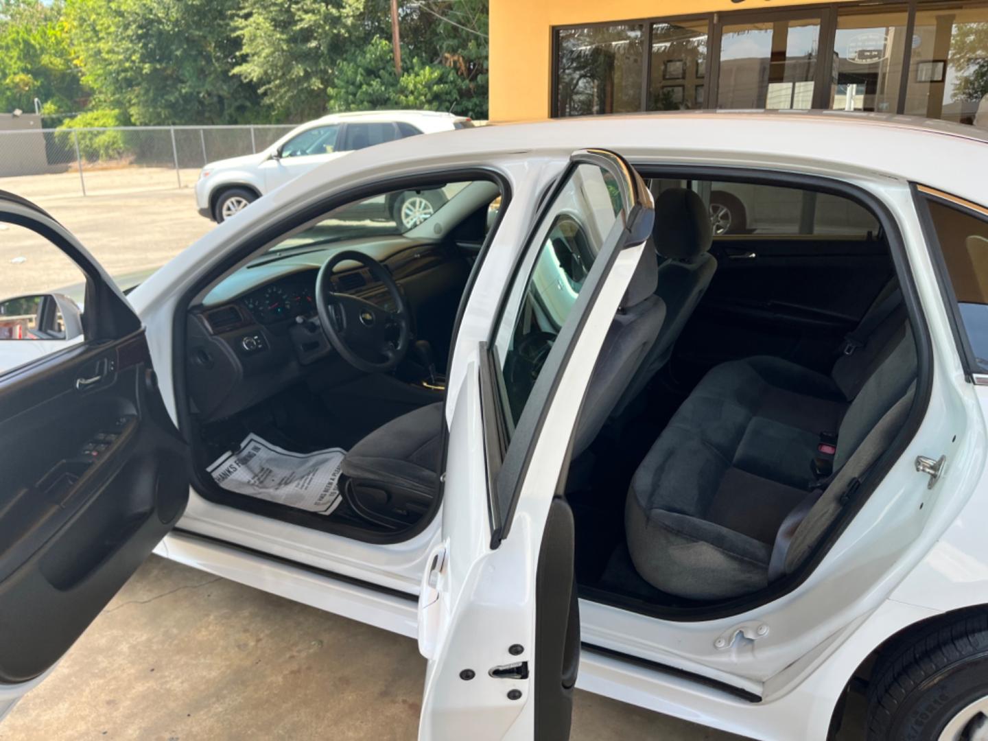 2012 White Chevrolet Impala LS (Fleet) (2G1WF5E31C1) with an 3.6L V6 DOHC 16V FFV engine, 6-Speed Automatic transmission, located at 307 West Marshall Avenue, Longview, TX, 75601, (903) 753-3091, 32.500828, -94.742577 - Photo#5