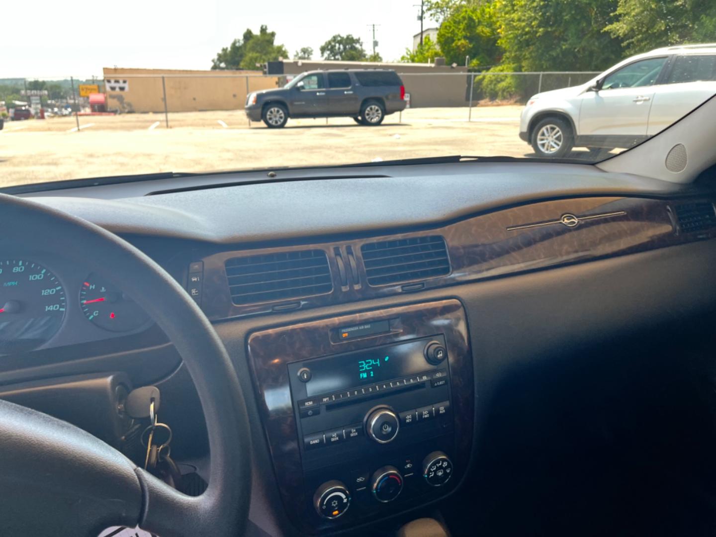 2012 White Chevrolet Impala LS (Fleet) (2G1WF5E31C1) with an 3.6L V6 DOHC 16V FFV engine, 6-Speed Automatic transmission, located at 307 West Marshall Avenue, Longview, TX, 75601, (903) 753-3091, 32.500828, -94.742577 - Photo#6