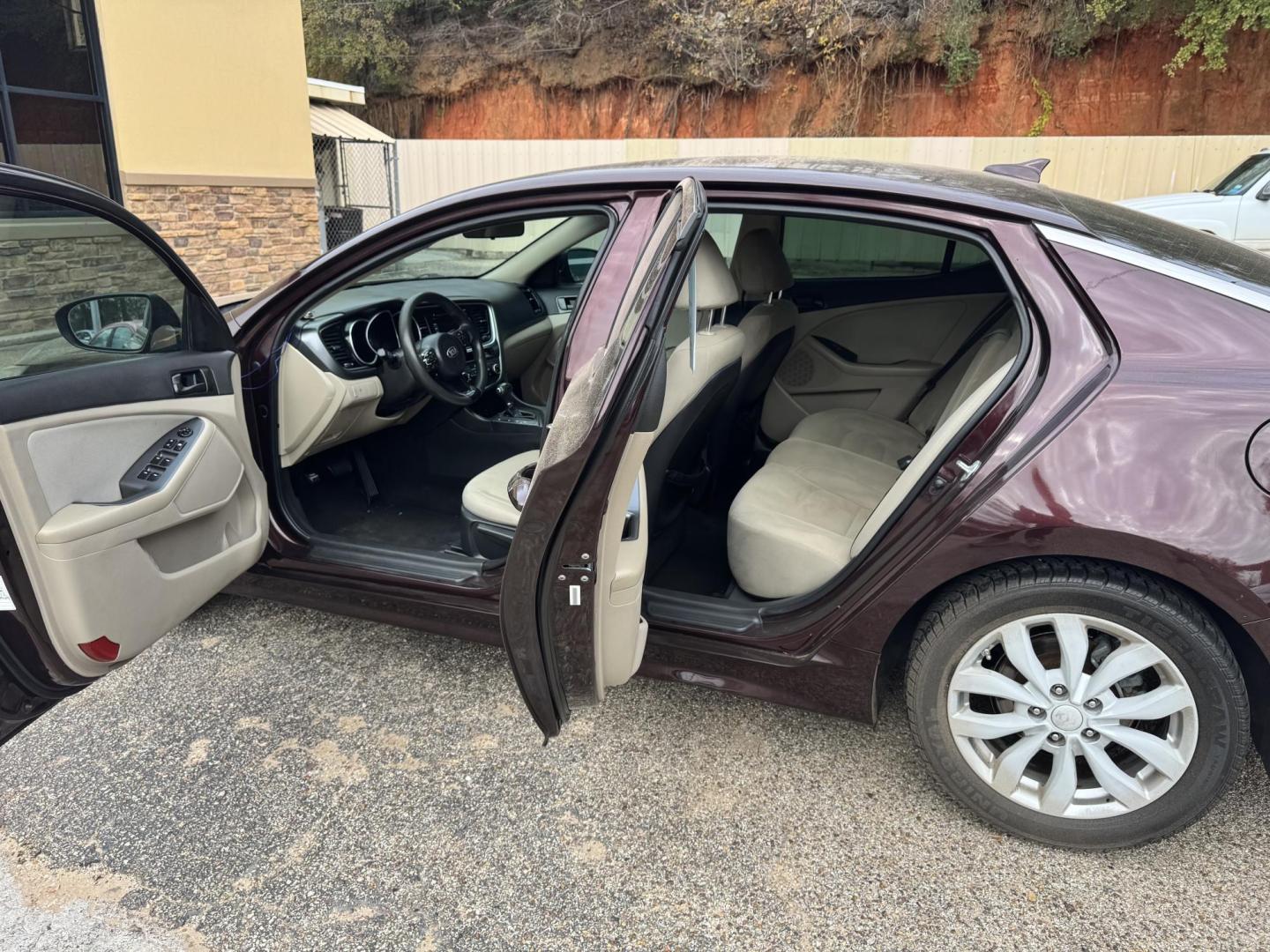 2014 Maroon Kia Optima LX (5XXGM4A71EG) with an 2.4L L4 DOHC 16V engine, 6-Speed Automatic transmission, located at 307 West Marshall Avenue, Longview, TX, 75601, (903) 753-3091, 32.500828, -94.742577 - Photo#5