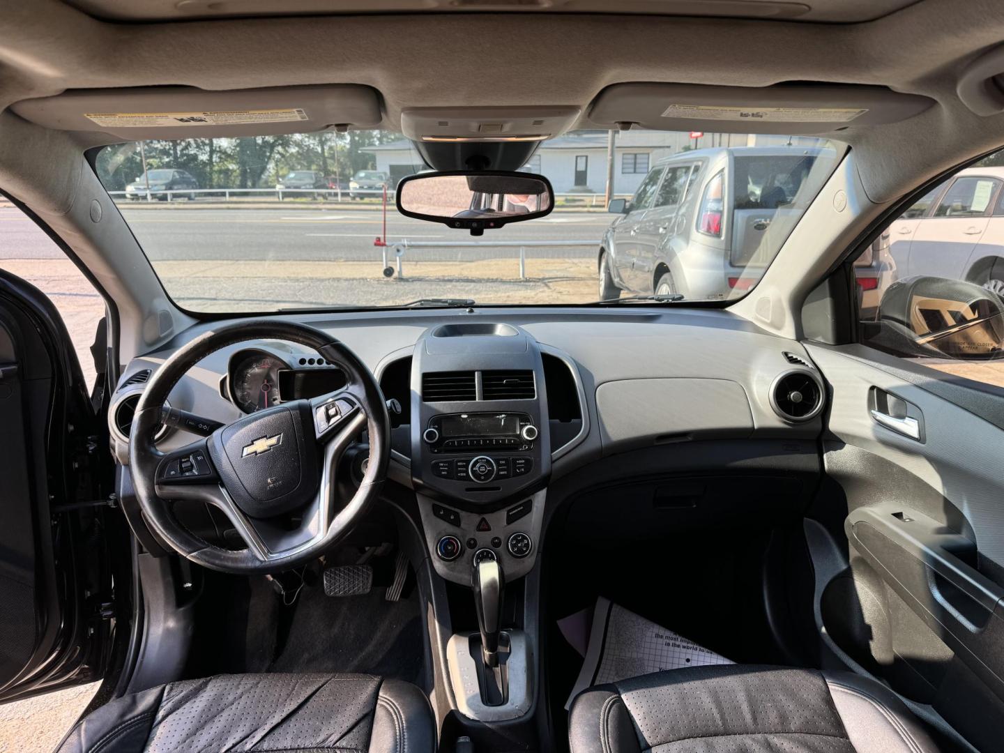 2012 BLACK Chevrolet Sonic LTZ 5-Door (1G1JE6SH2C4) with an 1.8L L4 DOHC 24V FFV engine, 6-Speed Automatic transmission, located at 307 West Marshall Avenue, Longview, TX, 75601, (903) 753-3091, 32.500828, -94.742577 - Photo#5