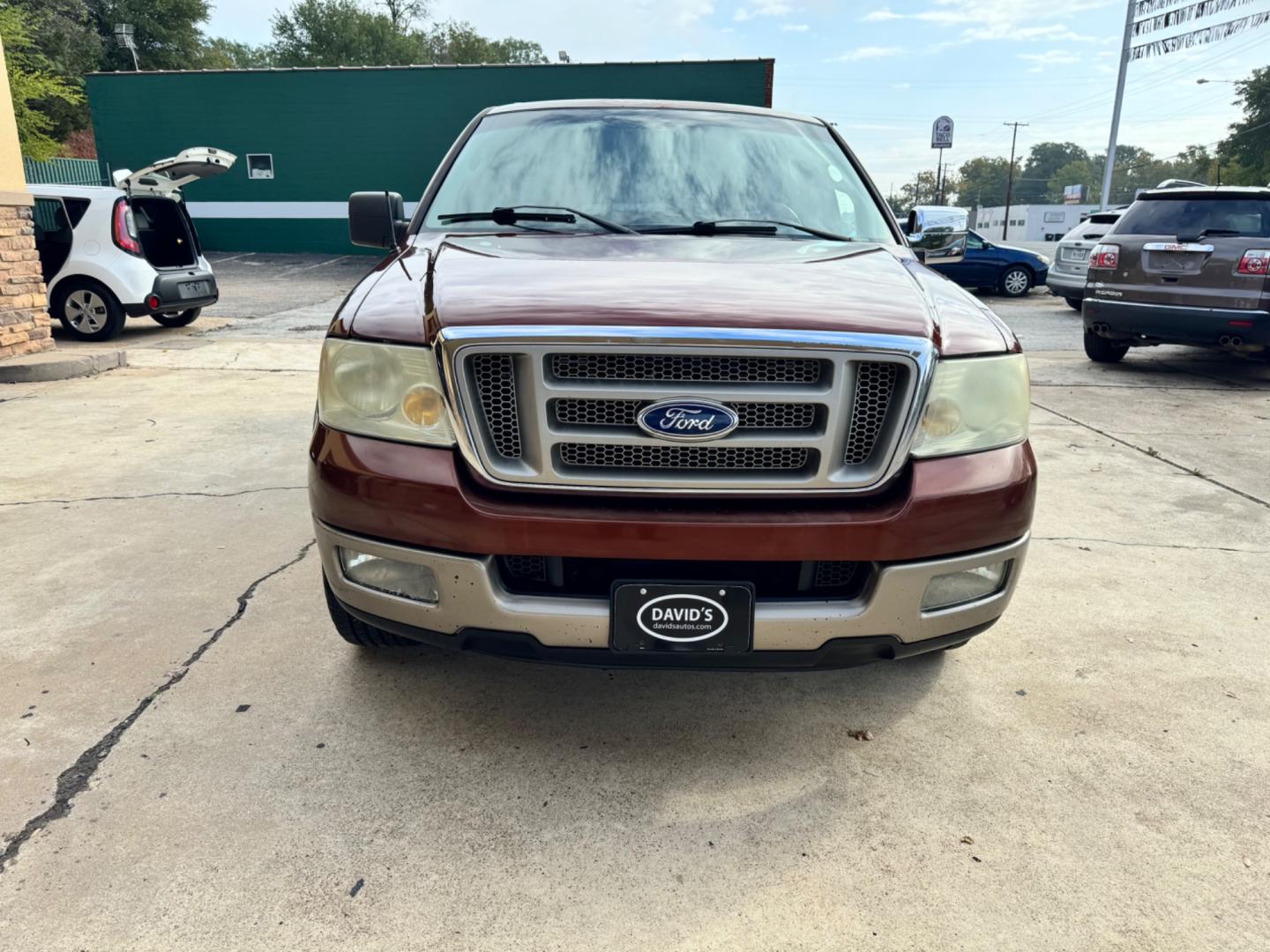 2005 Maroon Ford F-150 Lariat SuperCrew 2WD (1FTPW12525K) with an 5.4L V6 SOHC 16V engine, 4-Speed Automatic Overdrive transmission, located at 307 West Marshall Avenue, Longview, TX, 75601, (903) 753-3091, 32.500828, -94.742577 - Photo#0