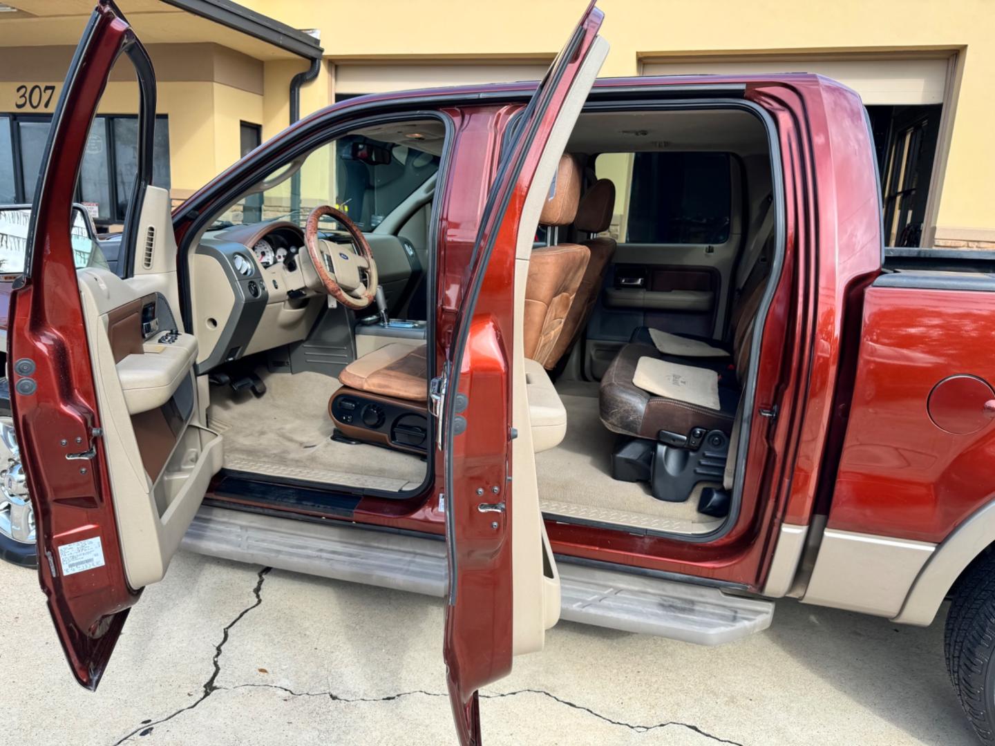 2005 Maroon Ford F-150 Lariat SuperCrew 2WD (1FTPW12525K) with an 5.4L V6 SOHC 16V engine, 4-Speed Automatic Overdrive transmission, located at 307 West Marshall Avenue, Longview, TX, 75601, (903) 753-3091, 32.500828, -94.742577 - Photo#5