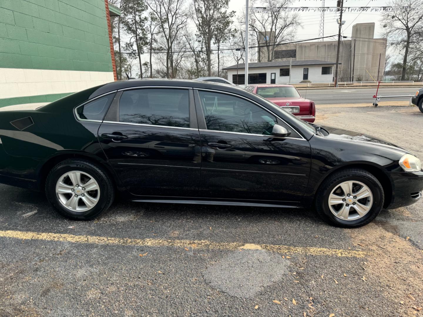 2015 BLACK Chevrolet Impala Limited LS (2G1WA5E39F1) with an 3.6L V6 DOHC 16V FFV engine, 6-Speed Automatic transmission, located at 307 West Marshall Avenue, Longview, TX, 75601, (903) 753-3091, 32.500828, -94.742577 - Photo#0