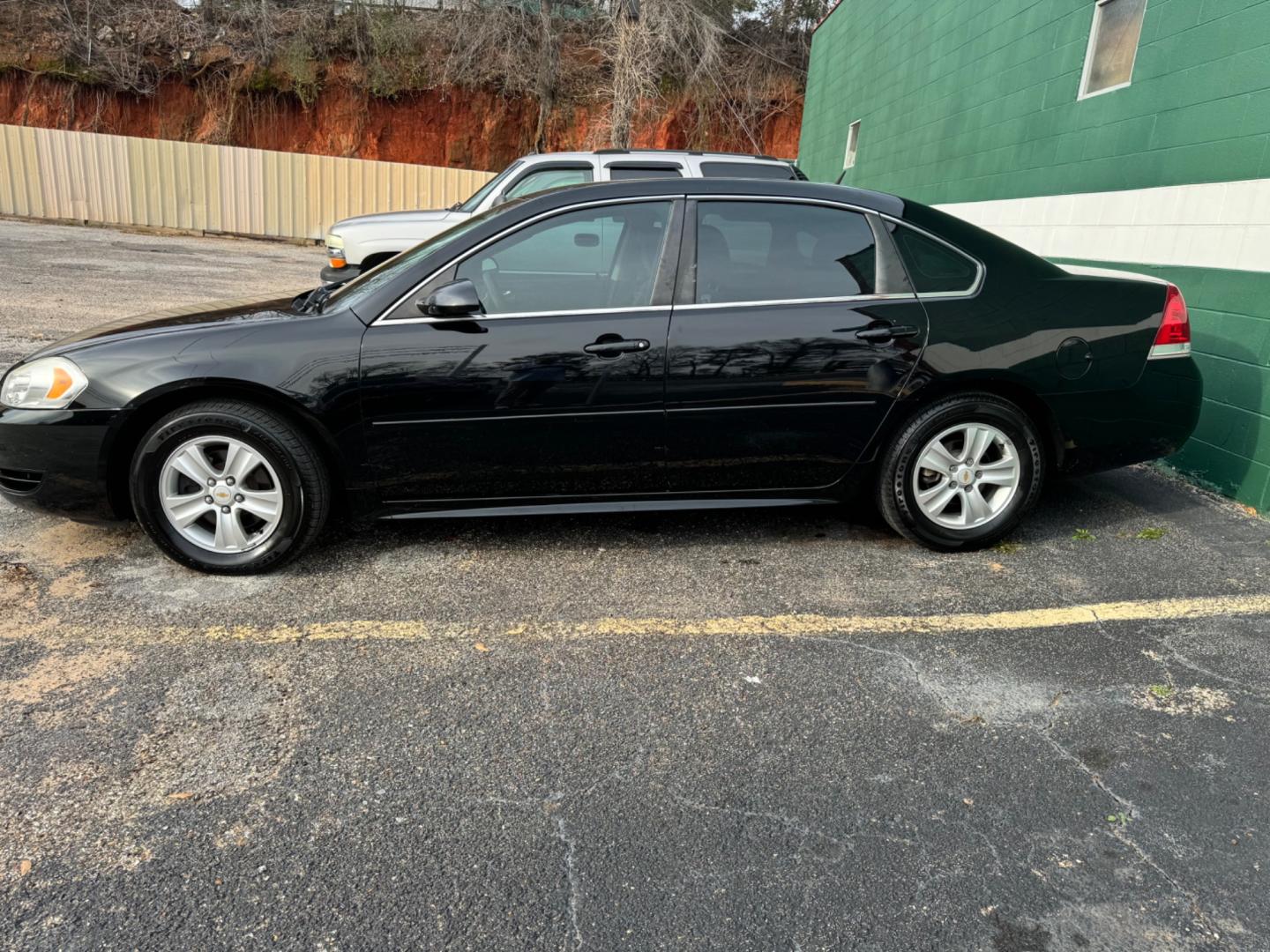 2015 BLACK Chevrolet Impala Limited LS (2G1WA5E39F1) with an 3.6L V6 DOHC 16V FFV engine, 6-Speed Automatic transmission, located at 307 West Marshall Avenue, Longview, TX, 75601, (903) 753-3091, 32.500828, -94.742577 - Photo#1