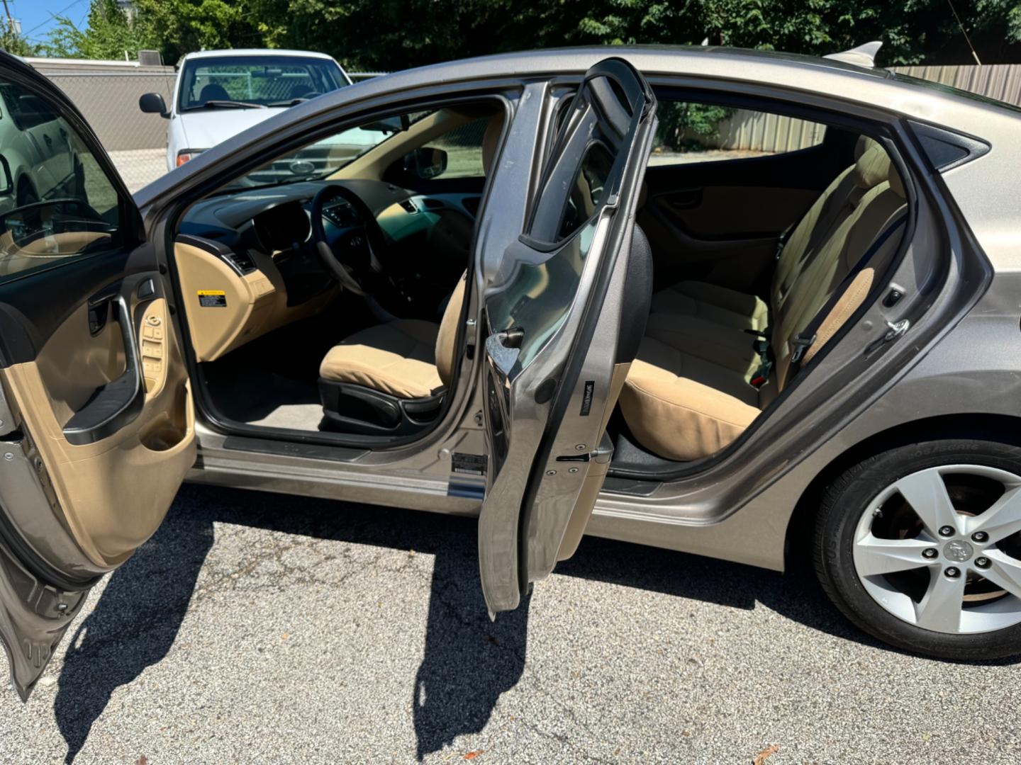 2013 BEIGE Hyundai Elantra (5NPDH4AE8DH) , located at 307 West Marshall Avenue, Longview, TX, 75601, (903) 753-3091, 32.500828, -94.742577 - Photo#3