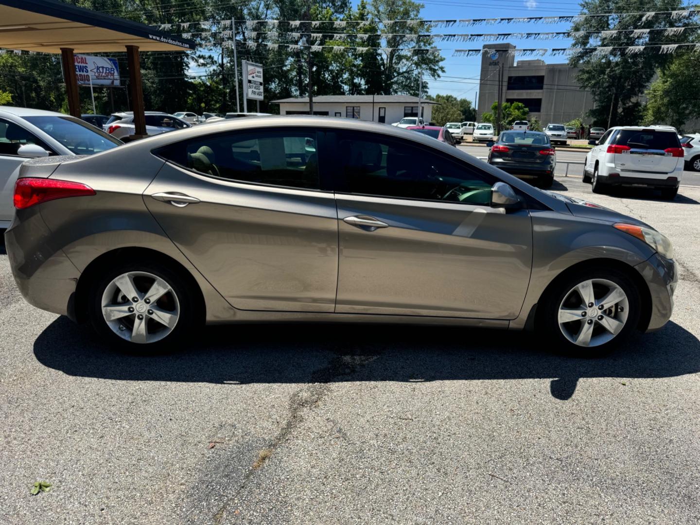 2013 BEIGE Hyundai Elantra (5NPDH4AE8DH) , located at 307 West Marshall Avenue, Longview, TX, 75601, (903) 753-3091, 32.500828, -94.742577 - Photo#1