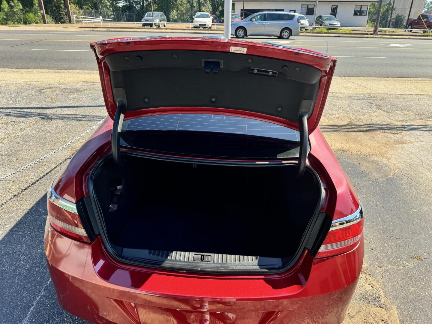 2015 RED Buick Verano Base (1G4PP5SK1F4) with an 2.4L L4 DOHC 16V FFV engine, 6-Speed Automatic transmission, located at 307 West Marshall Avenue, Longview, TX, 75601, (903) 753-3091, 32.500828, -94.742577 - Photo#4