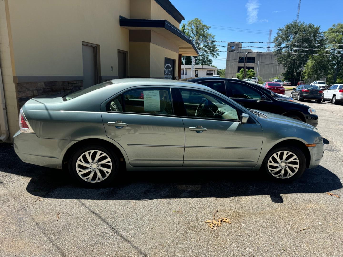 2006 GREEN Ford Fusion (3FAHP07ZX6R) , located at 307 West Marshall Avenue, Longview, TX, 75601, (903) 753-3091, 32.500828, -94.742577 - Photo#2