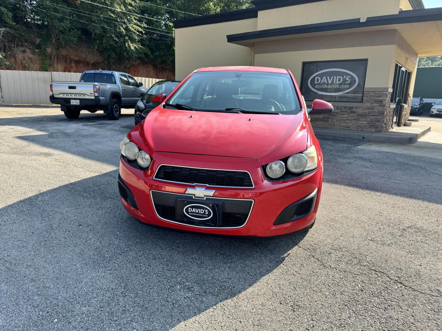 2014 Chevrolet Sonic LS Auto Sedan (1G1JA5SH0E4) with an 1.8L L4 DOHC 24V engine, 6-Speed Automatic transmission, located at 307 West Marshall Avenue, Longview, TX, 75601, (903) 753-3091, 32.500828, -94.742577 - Photo#2