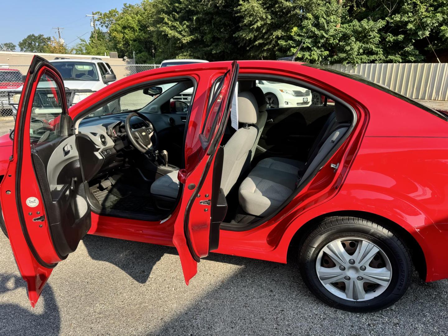 2014 Chevrolet Sonic LS Auto Sedan (1G1JA5SH0E4) with an 1.8L L4 DOHC 24V engine, 6-Speed Automatic transmission, located at 307 West Marshall Avenue, Longview, TX, 75601, (903) 753-3091, 32.500828, -94.742577 - Photo#3