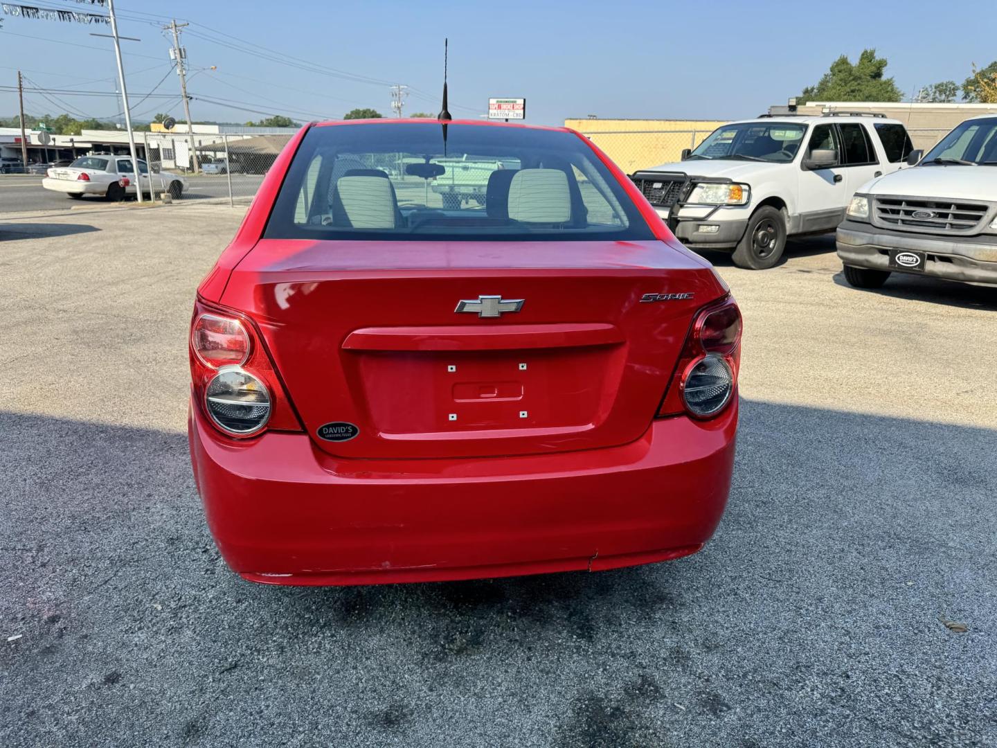 2014 Chevrolet Sonic LS Auto Sedan (1G1JA5SH0E4) with an 1.8L L4 DOHC 24V engine, 6-Speed Automatic transmission, located at 307 West Marshall Avenue, Longview, TX, 75601, (903) 753-3091, 32.500828, -94.742577 - Photo#5