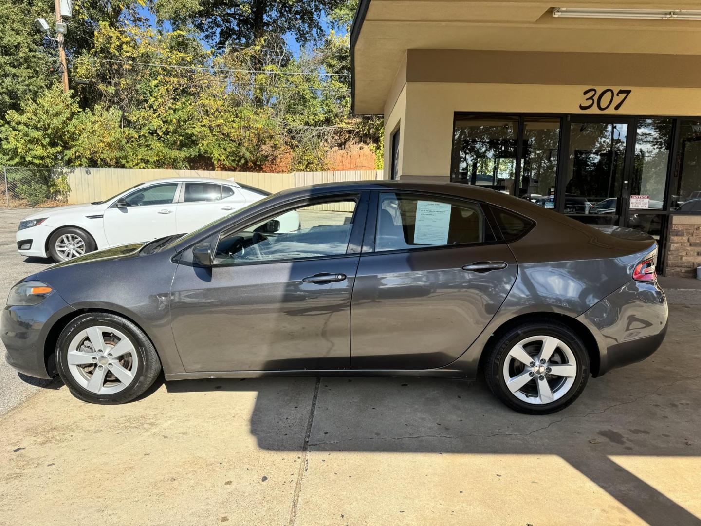 2015 Gray Dodge Dart SXT (1C3CDFBB5FD) with an 2.4L L4 DOHC 16V engine, located at 307 West Marshall Avenue, Longview, TX, 75601, (903) 753-3091, 32.500828, -94.742577 - Photo#1