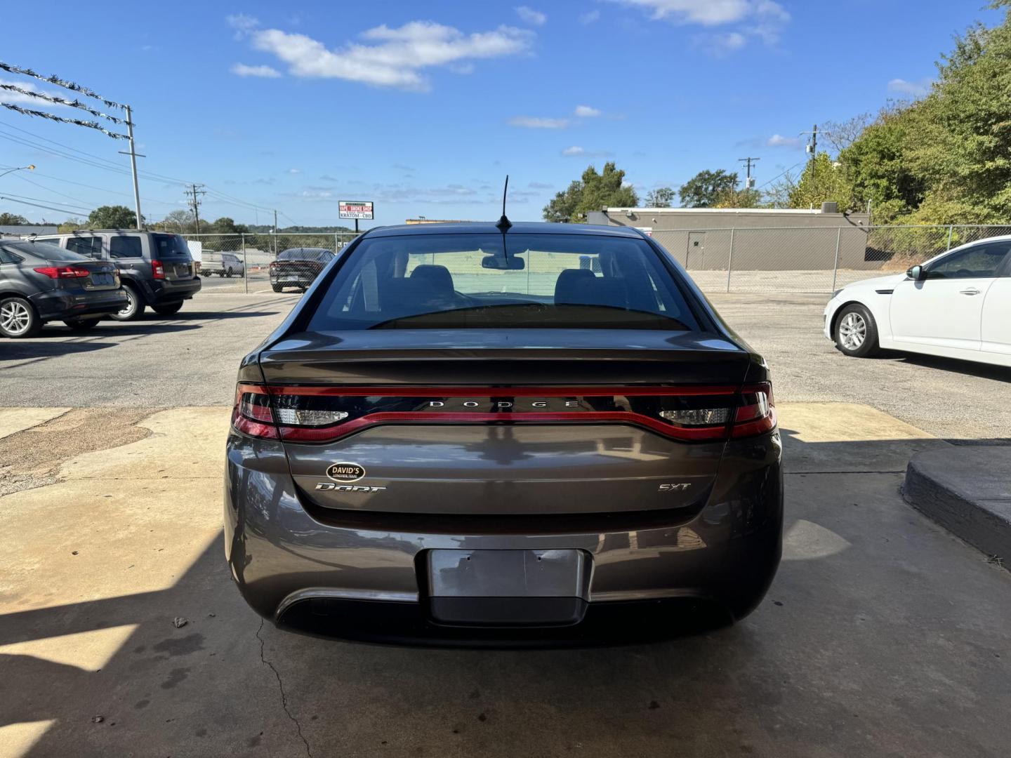 2015 Gray Dodge Dart SXT (1C3CDFBB5FD) with an 2.4L L4 DOHC 16V engine, located at 307 West Marshall Avenue, Longview, TX, 75601, (903) 753-3091, 32.500828, -94.742577 - Photo#2