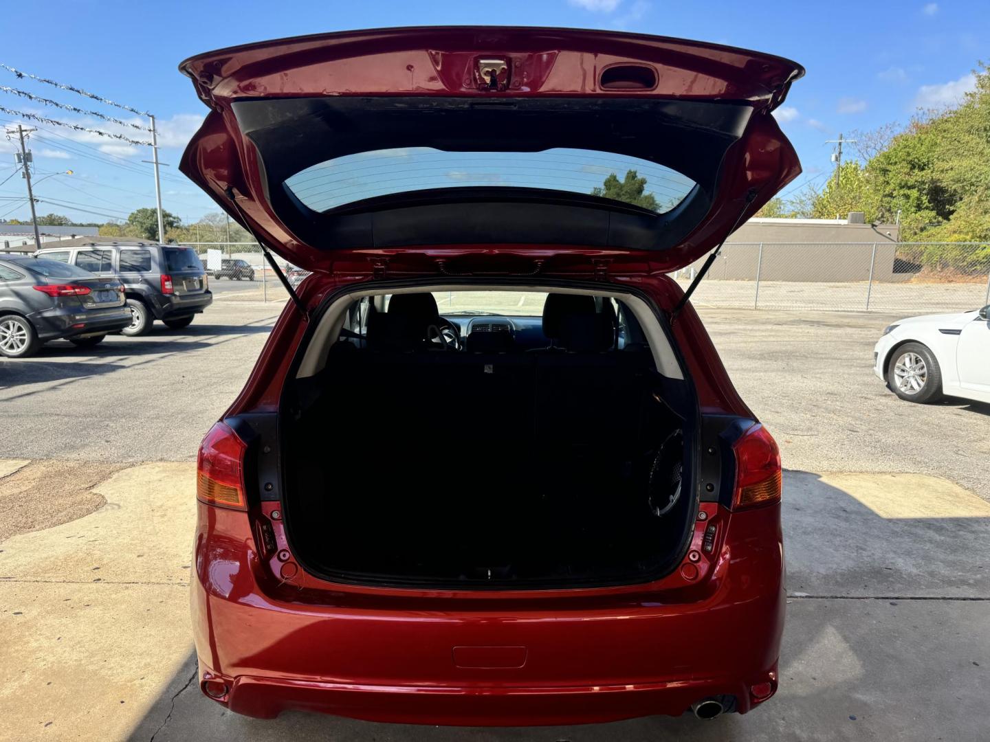 2014 MAROON Mitsubishi Outlander Sport SE 2WD (4A4AP4AU6EE) with an 2.0L L4 DOHC 16V engine, Continuously Variable Transmission transmission, located at 307 West Marshall Avenue, Longview, TX, 75601, (903) 753-3091, 32.500828, -94.742577 - Photo#4