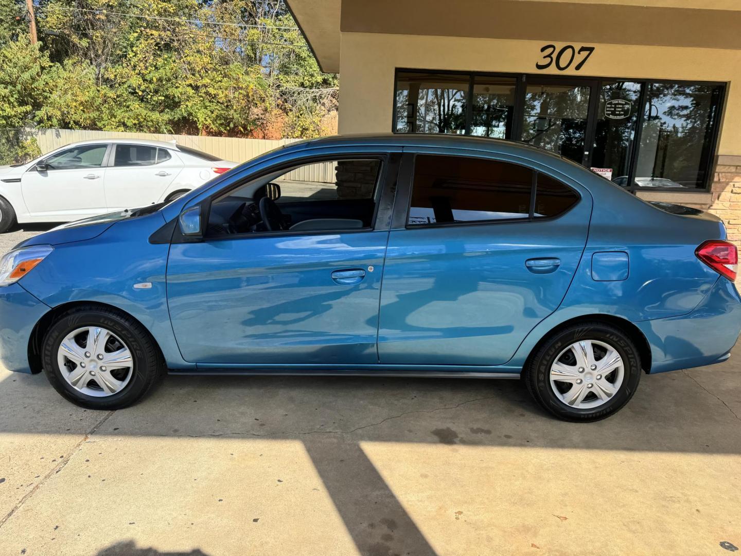 2019 BLUE Mitsubishi Mirage G4 ES 5M (ML32F3FJ6KH) with an 1.2L L3 DOHC engine, 5M transmission, located at 307 West Marshall Avenue, Longview, TX, 75601, (903) 753-3091, 32.500828, -94.742577 - Photo#2