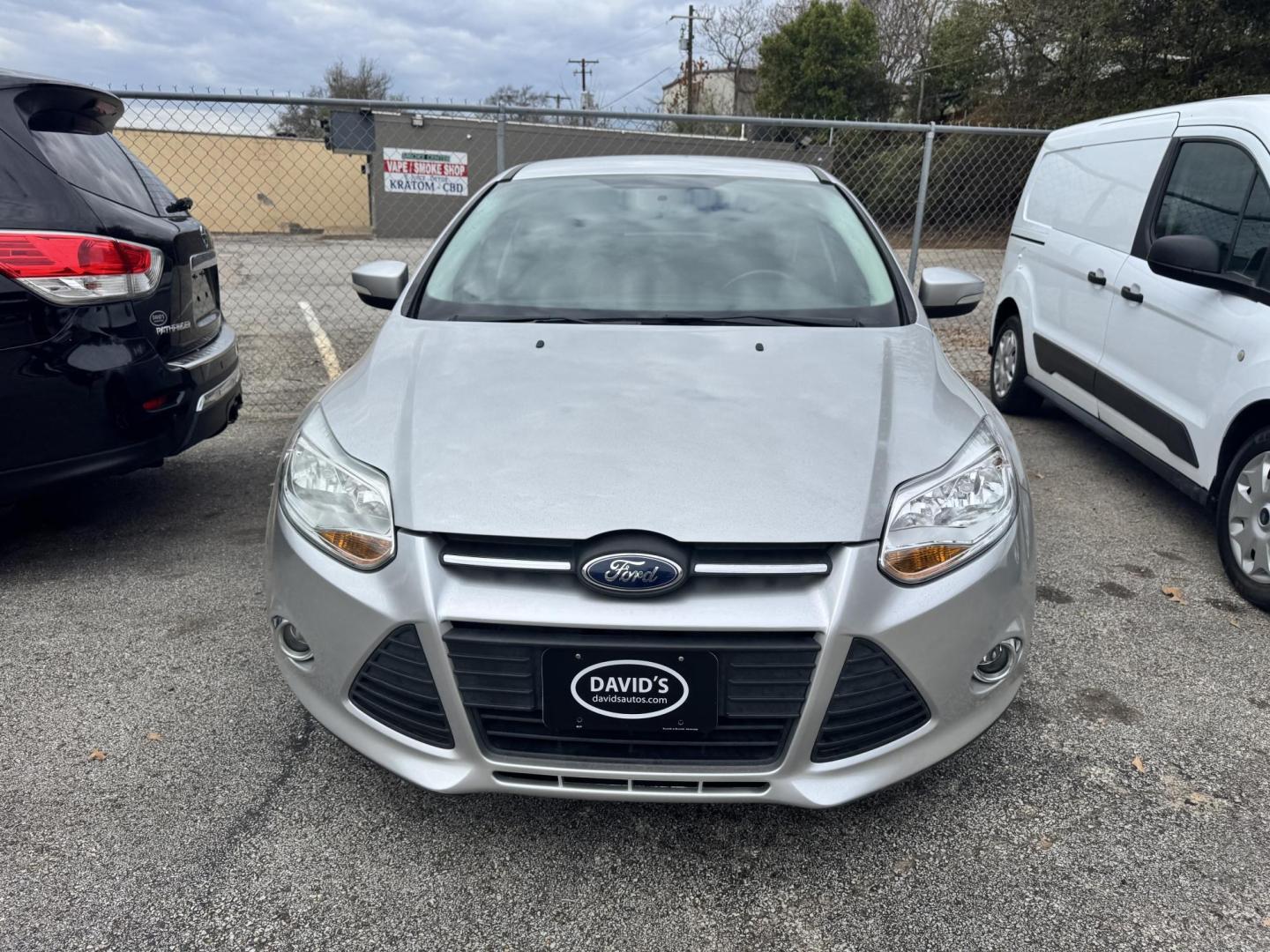 2014 SILVER Ford Focus SE Sedan (1FADP3F29EL) with an 2.0L L4 DOHC 16V engine, located at 307 West Marshall Avenue, Longview, TX, 75601, (903) 753-3091, 32.500828, -94.742577 - Photo#0