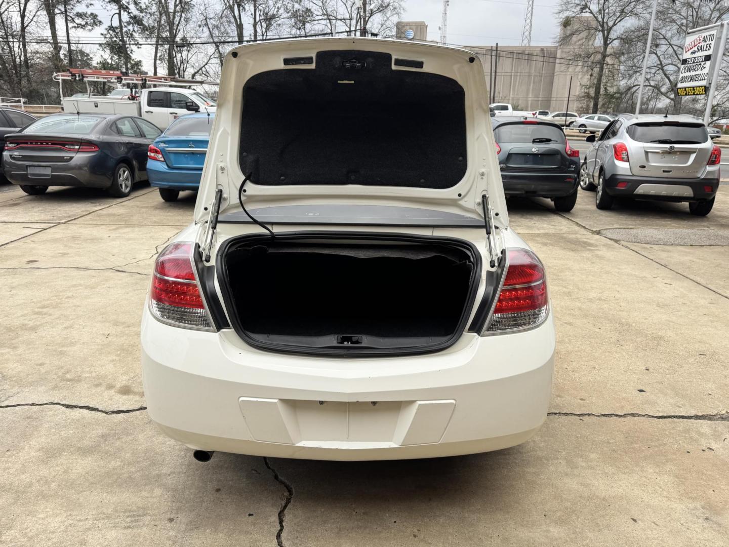 2007 White Saturn Aura XE (1G8ZS57N37F) with an 3.5L V6 12V OHV engine, 4-Speed Automatic Overdrive transmission, located at 307 West Marshall Avenue, Longview, TX, 75601, (903) 753-3091, 32.500828, -94.742577 - Photo#3