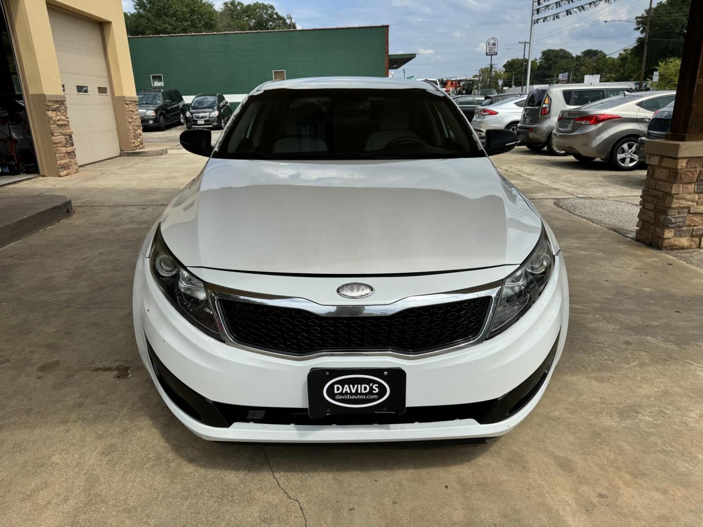 2013 White Kia Optima LX MT (5XXGM4A74DG) with an 2.4L L4 DOHC 16V engine, located at 307 West Marshall Avenue, Longview, TX, 75601, (903) 753-3091, 32.500828, -94.742577 - Photo#5